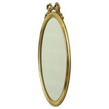 Miroir ovale classique doré à décor de ruban, France