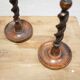 Paire de bougeoirs anciens en bois et bronze