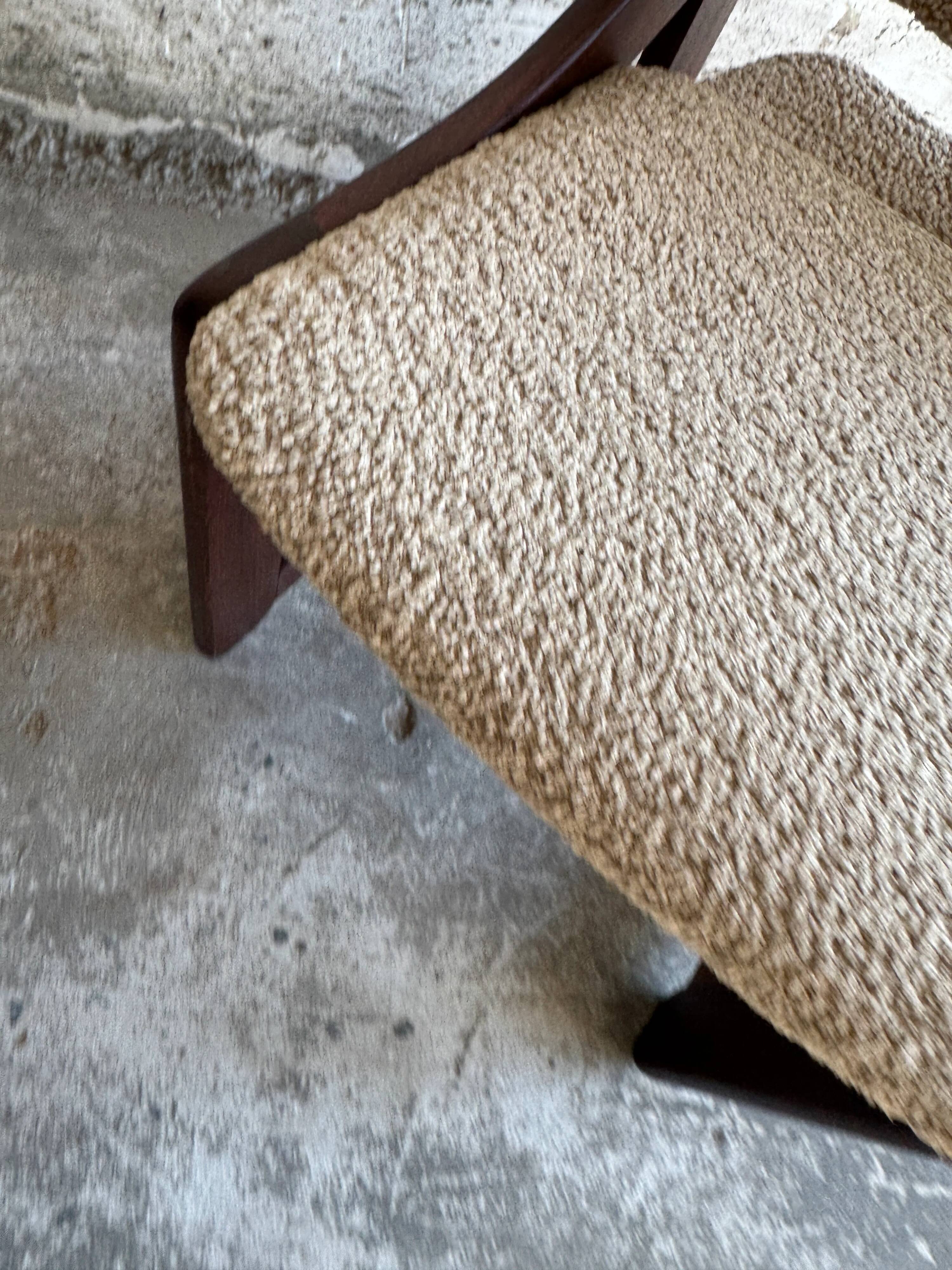 Mid-century white laminate dining table with dark wood base and 4 beige upholstered chairs