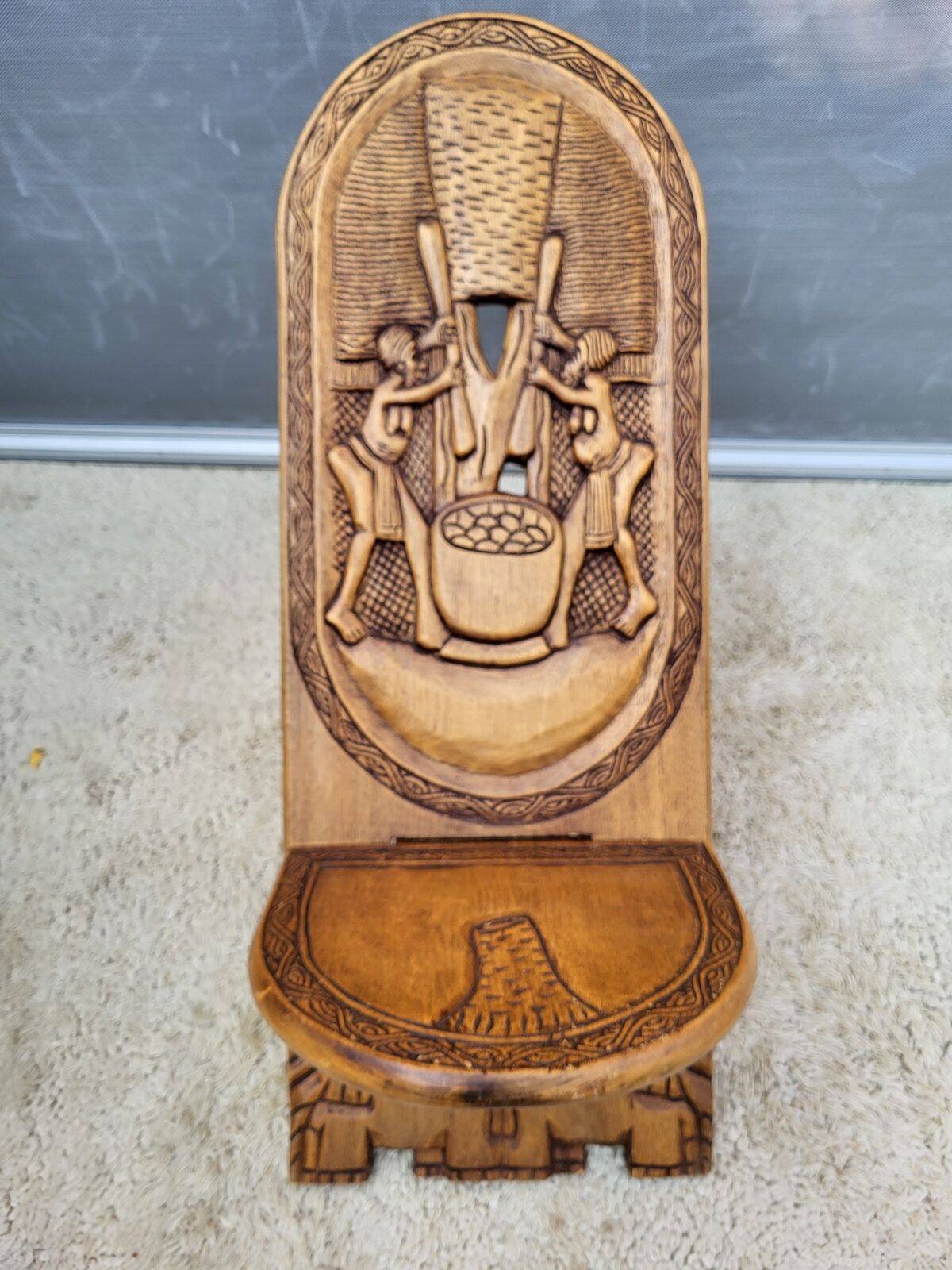 Chaise africaine bois sculpté escamotable