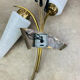 Pair of 1950s wall lights in brass and opaline tulips, Lunel/Arlus