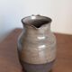 Signed sandstone pitcher