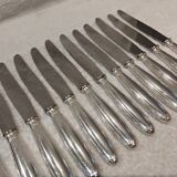 12 silver-plated table knives, Christofle goldsmith ribbons