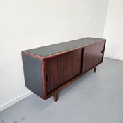 Vintage enfilade in teak and leather, 1970s.