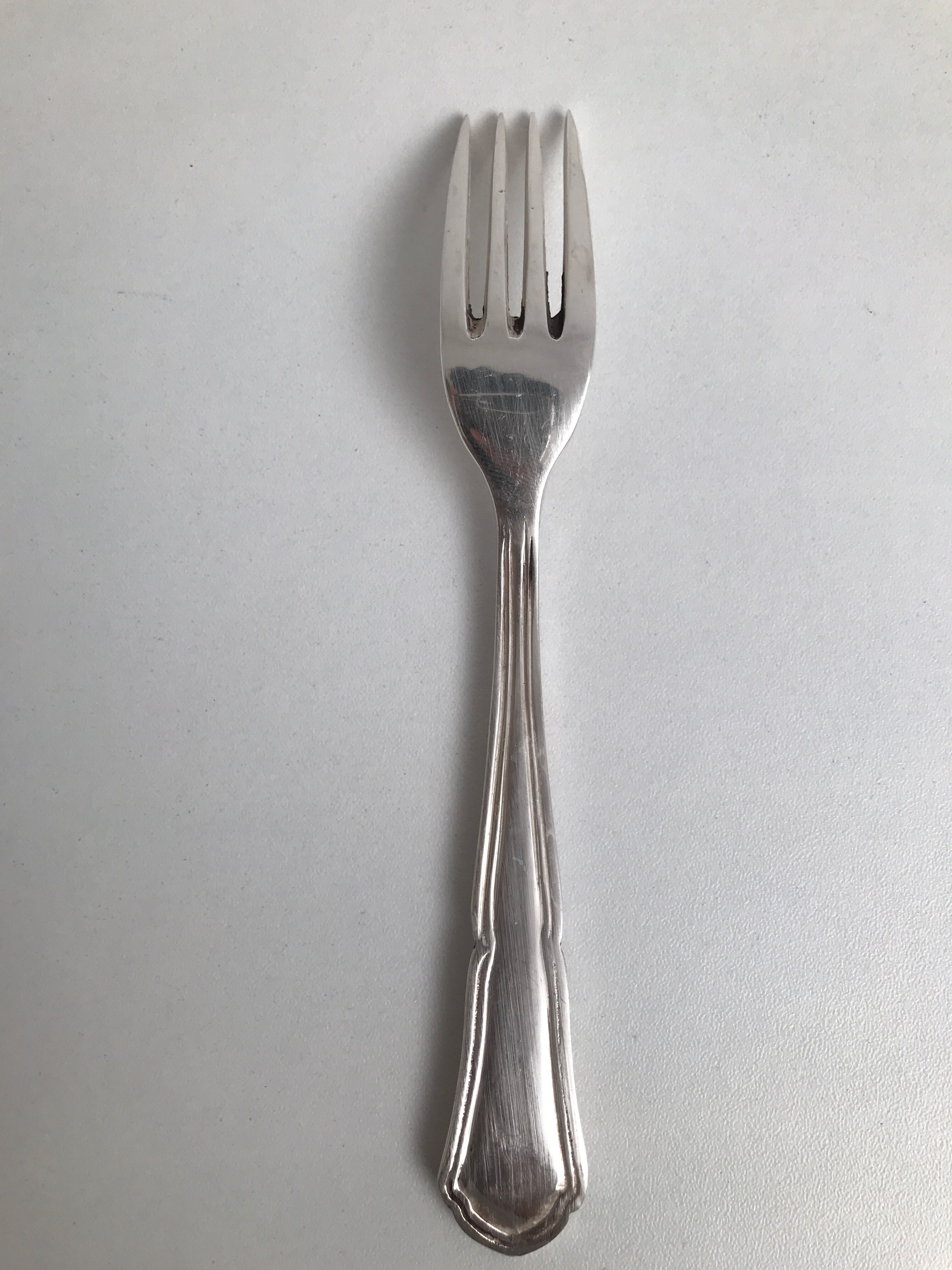 5 Small vintage metal silver forks