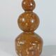 Unique vintage ceramic vase in the shape of a decorative sphere.