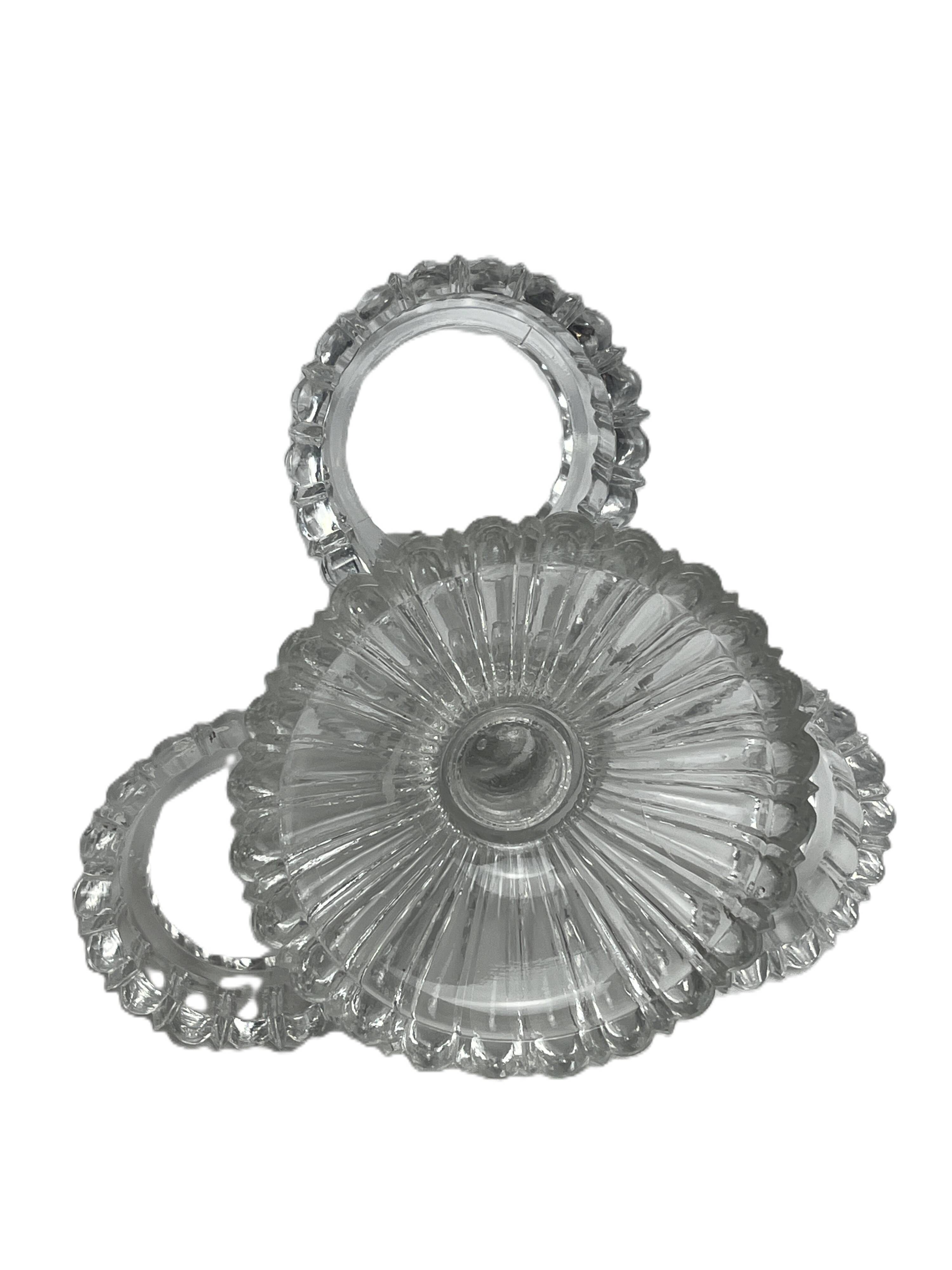 Tableware, two moulded glass table servants from the early 20th century.