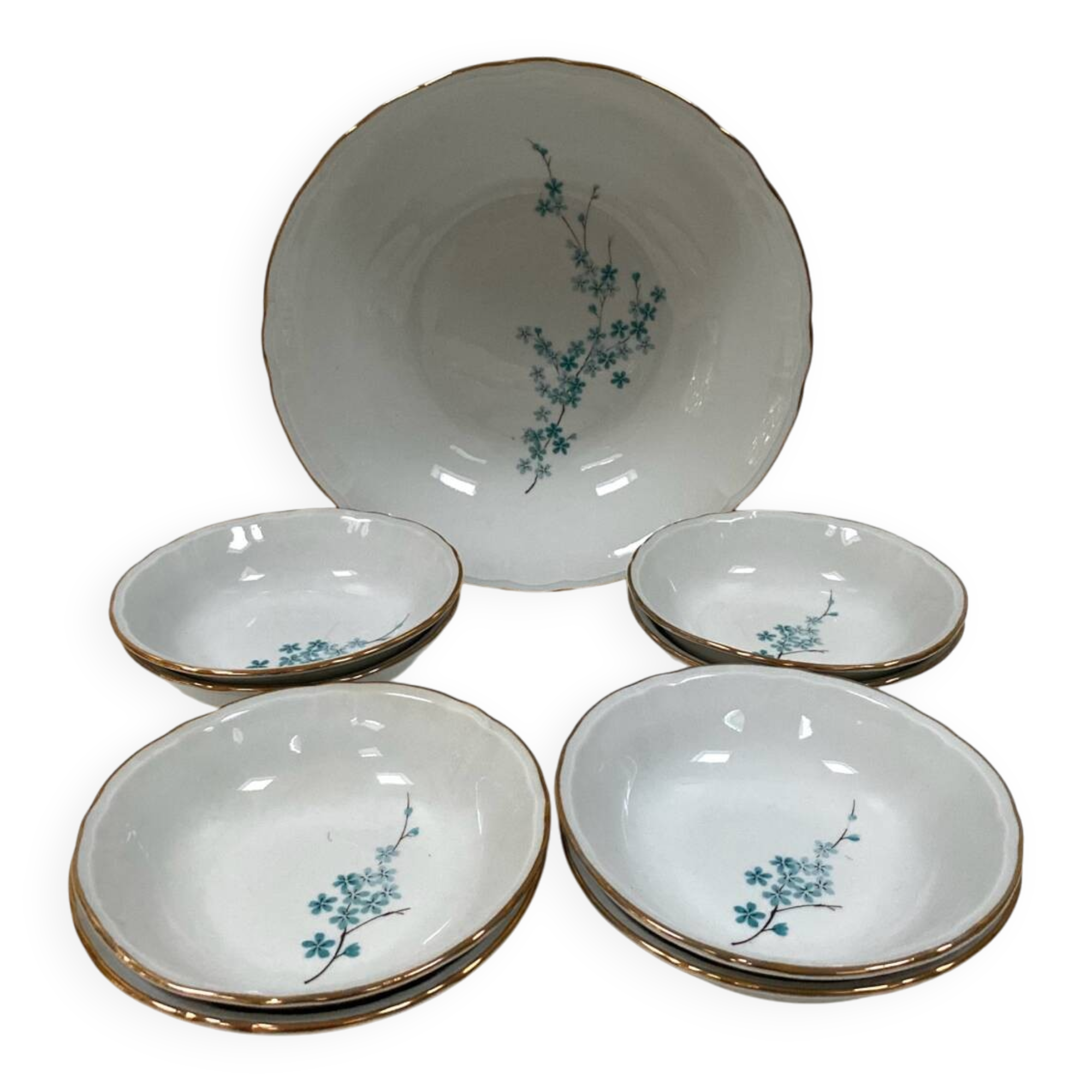Vintage porcelain service: salad bowl and 8 small bowls.