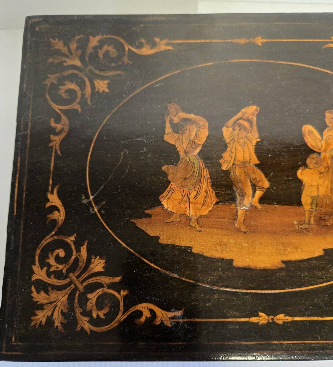 Sorrento marquetry box with a scene of three dancers in a medallion.