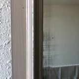 Large patinated wooden mirror with bevelled ice 73x113cm