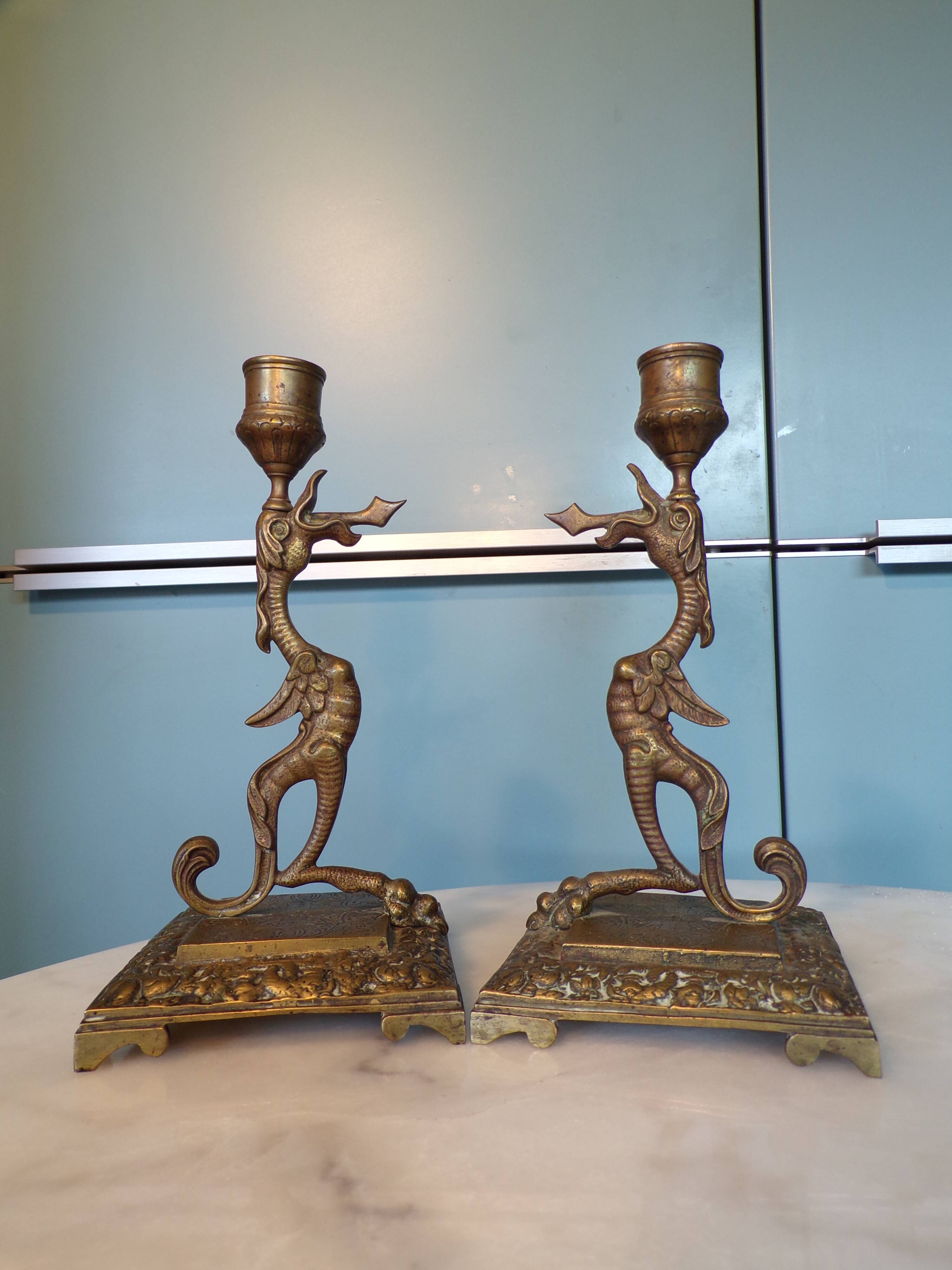 Pair of bronze chimera candlesticks