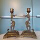 Pair of bronze chimera candlesticks