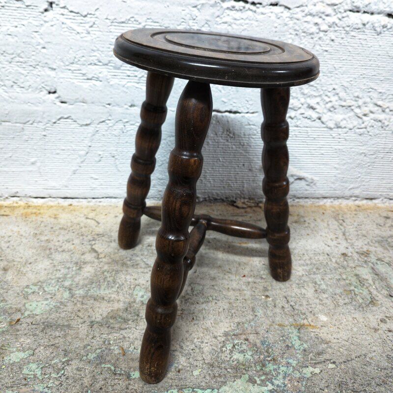 Tripod wooden stool turned