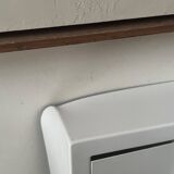 Modernist wall lamp with white metal shade, design by C. Grandidier.