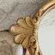 Crested mirror
