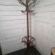 Curved antique wooden parrot