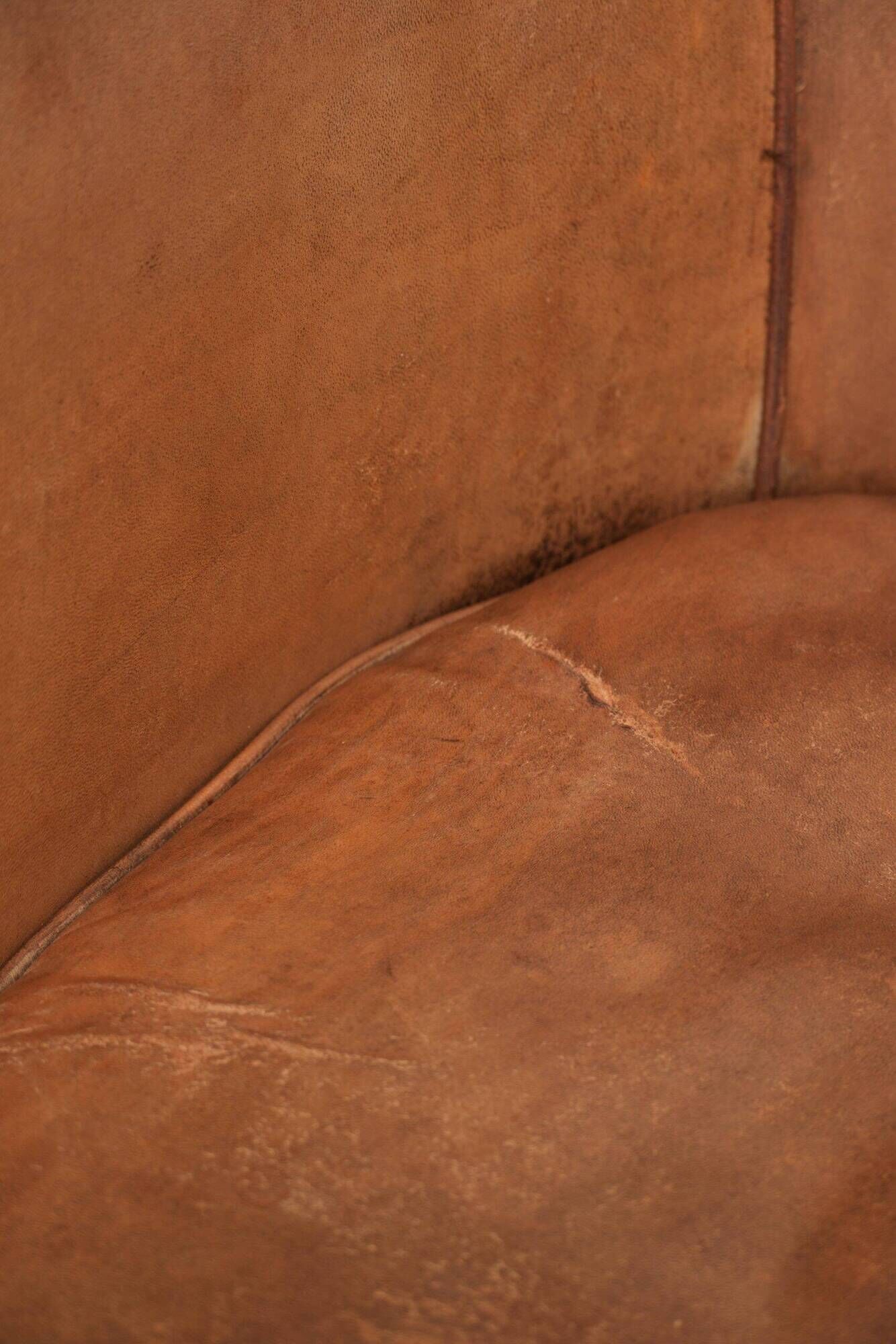 Vintage sheepskin club armchair in a beautiful light cognac colour