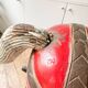 Large decorative rocking horse made of carved and hand-painted wood.
