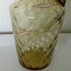Glass carafe with enamelled lily of the valley decoration.