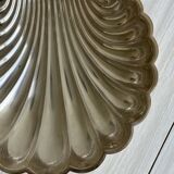 large silver-plated metal shell-shaped dish