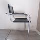 Fauteuil en inox et cuir