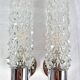 Pair of vintage Art Deco space age chrome and molded glass wall sconces