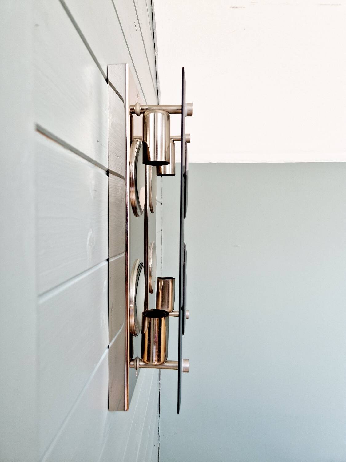 Pair of chrome metal and smoked glass wall sconces, 1970s.