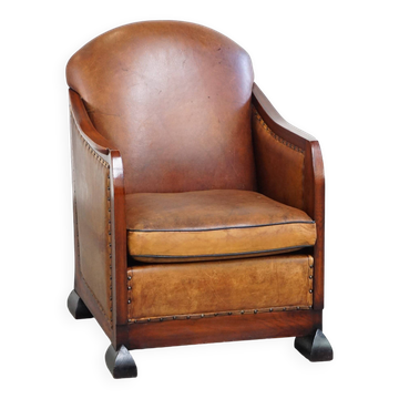 Unique, stately, comfortable sheepskin Art Deco design armchair
