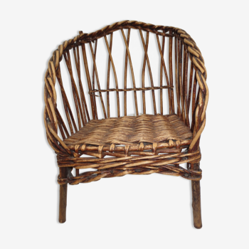 Old wicker armchair for dolls, toy