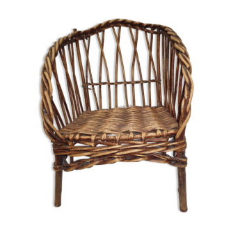 Old wicker armchair for dolls, toy