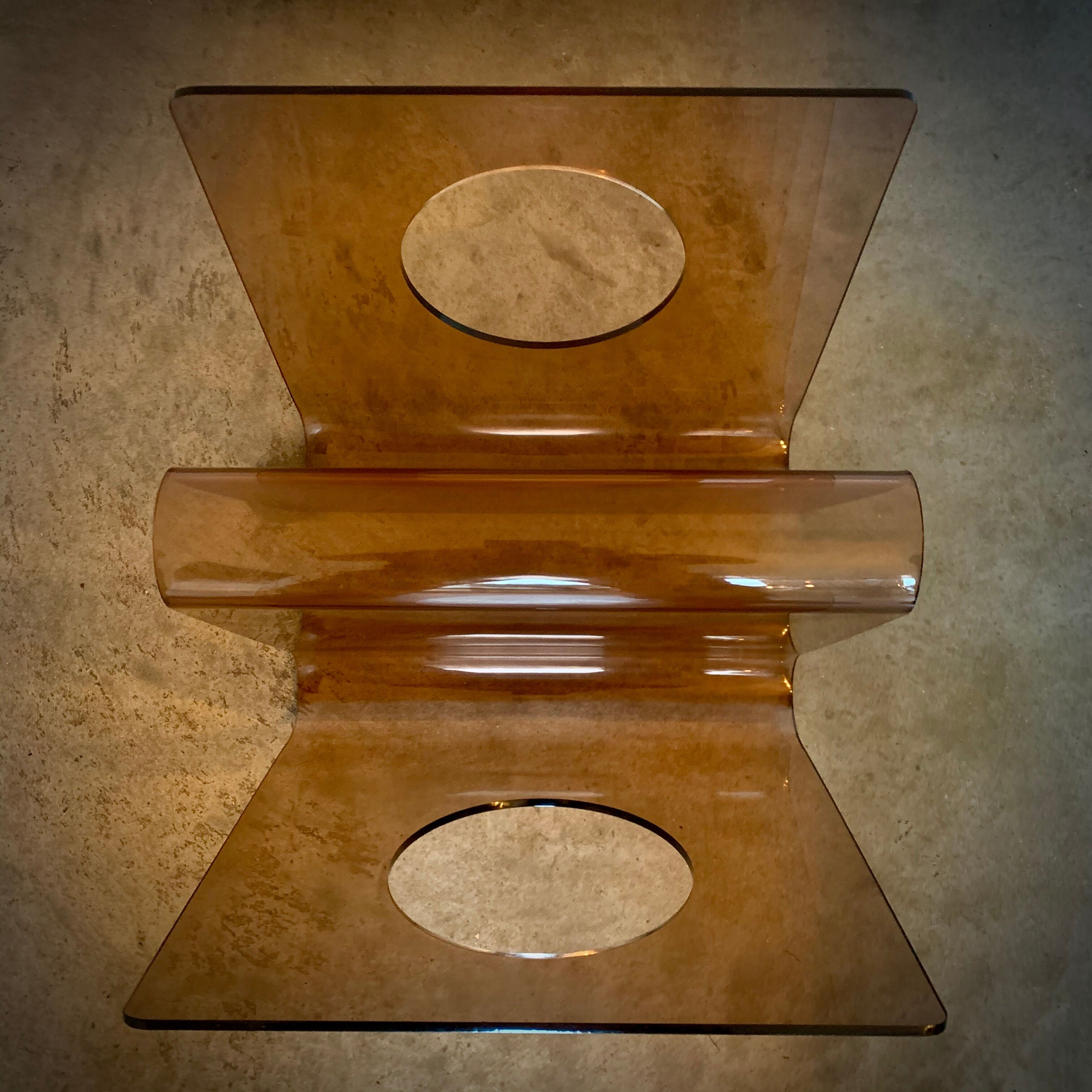 Michel Dumas' magazine rack in smoked altuglas, 1970s