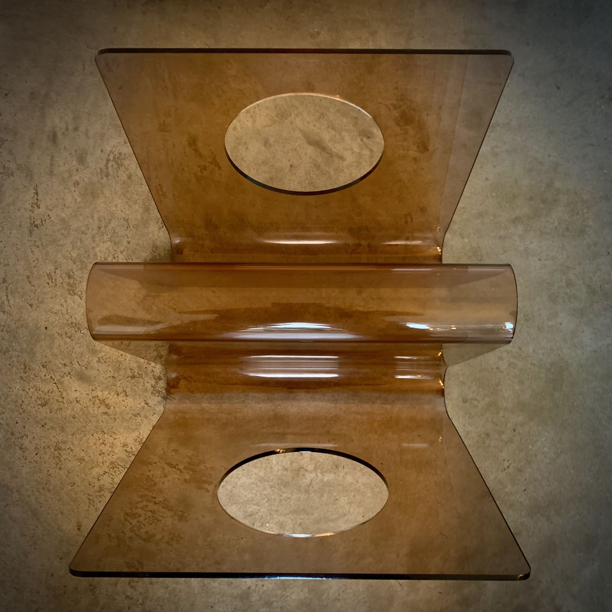 Michel Dumas' magazine rack in smoked altuglas, 1970s
