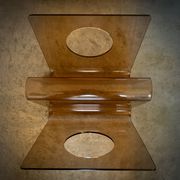 Michel Dumas' magazine rack in smoked altuglas, 1970s