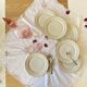 Set of 6 antique off-white porcelain dessert plates with gold trim