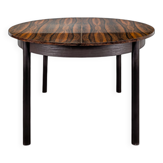 Scandinavian table in rosewood veneer with extension.