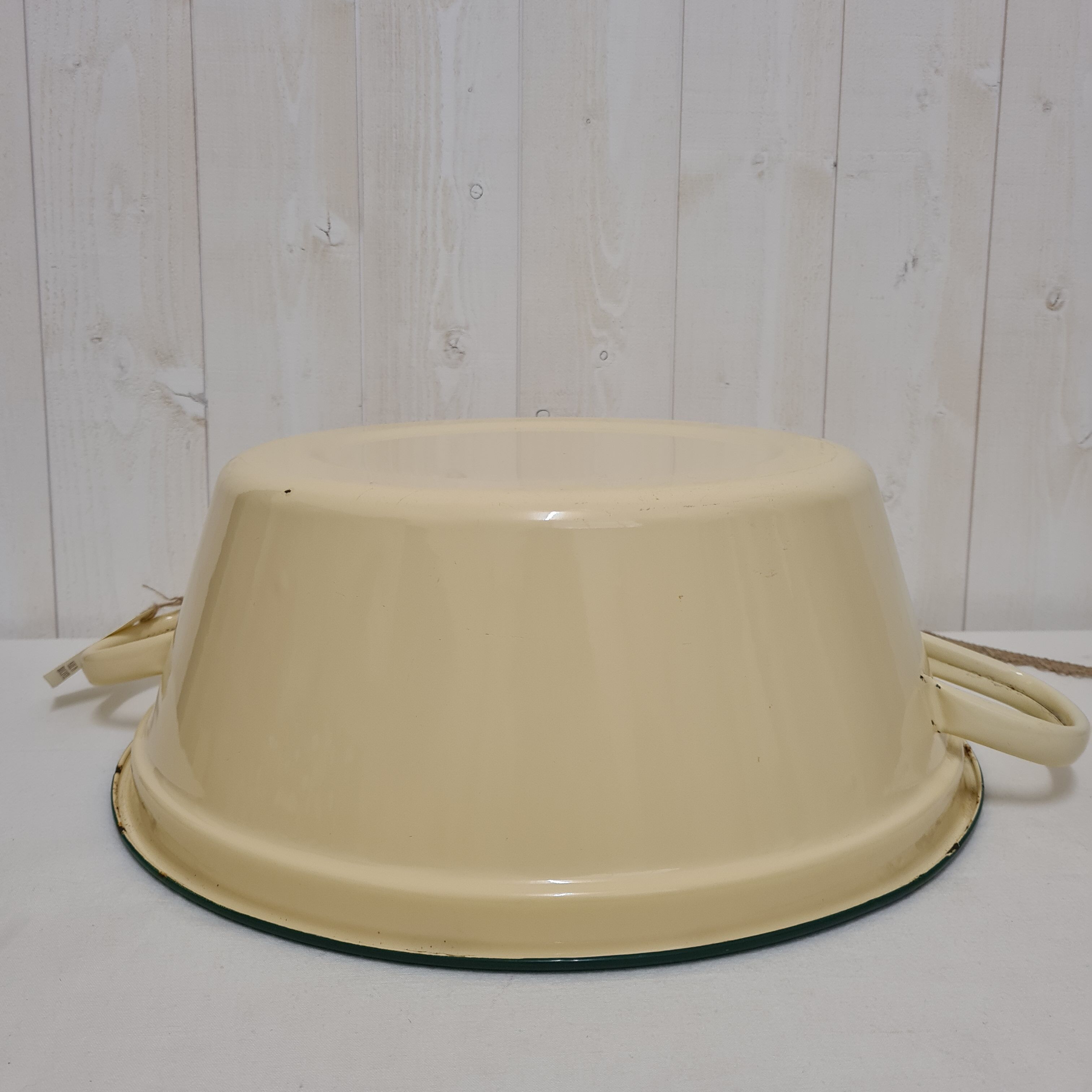 Yellow enamelled sheet metal basin