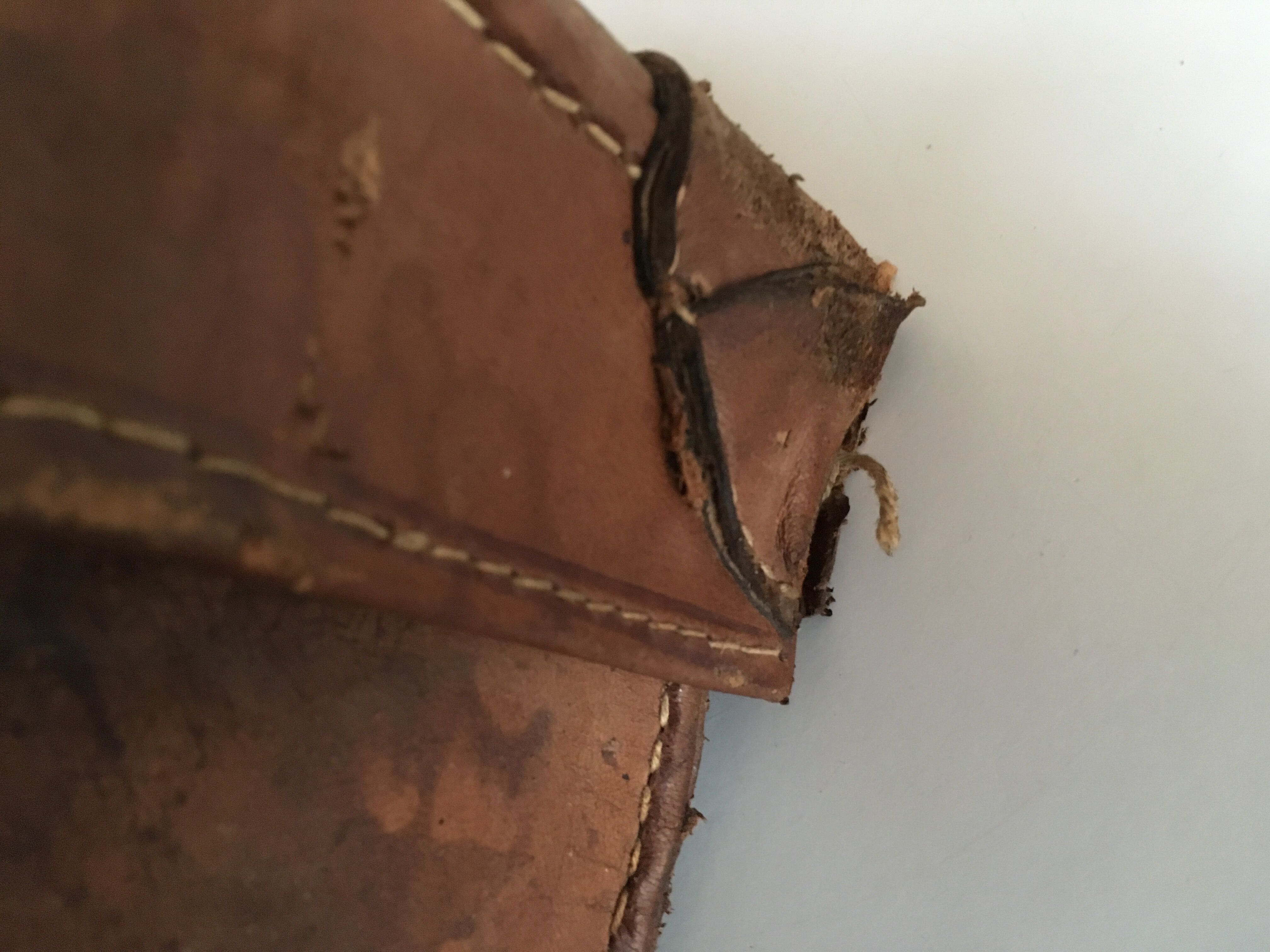 suitcase of leather with labels of palaces