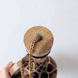 Amber glass carafe woven with wicker wooden handle