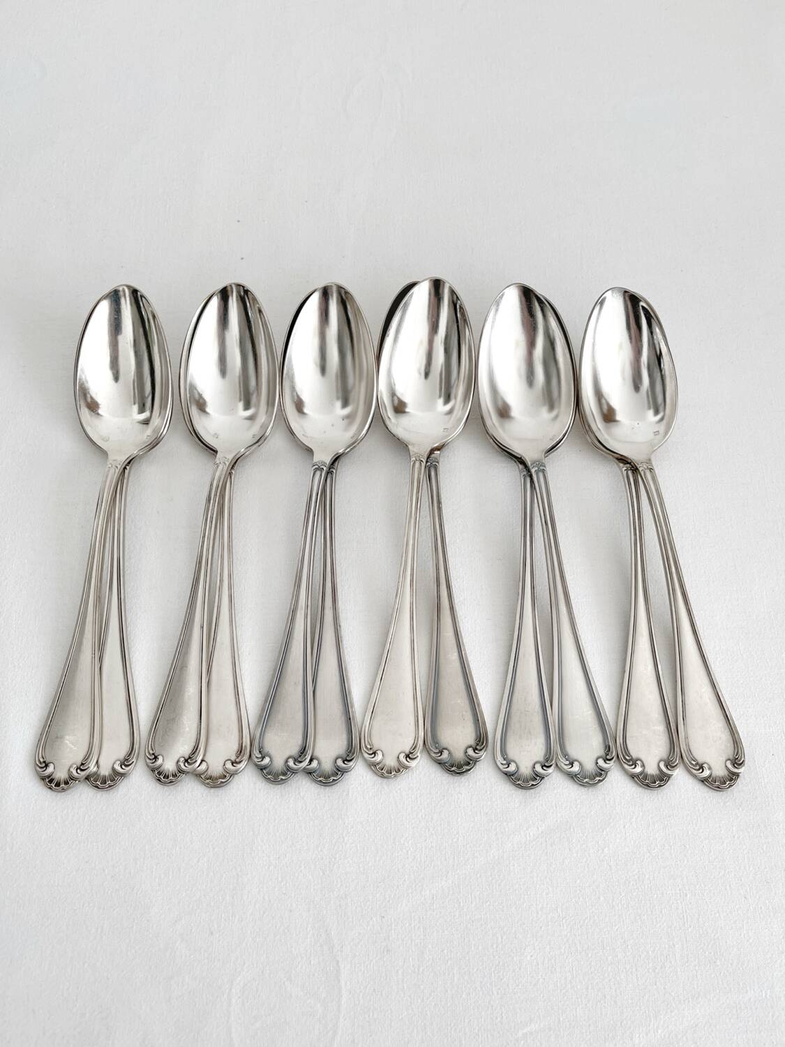 12 antique silver plated shell soup spoons