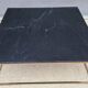 Table basse en marbre noir et laiton