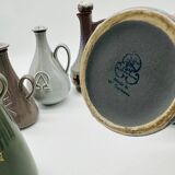 Set of nine modern sculptural ceramic vases from the mid-century, Bauhaus influence.