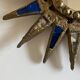 Sun mirror in gilded lead and blue glass Irena Jaworska 1960