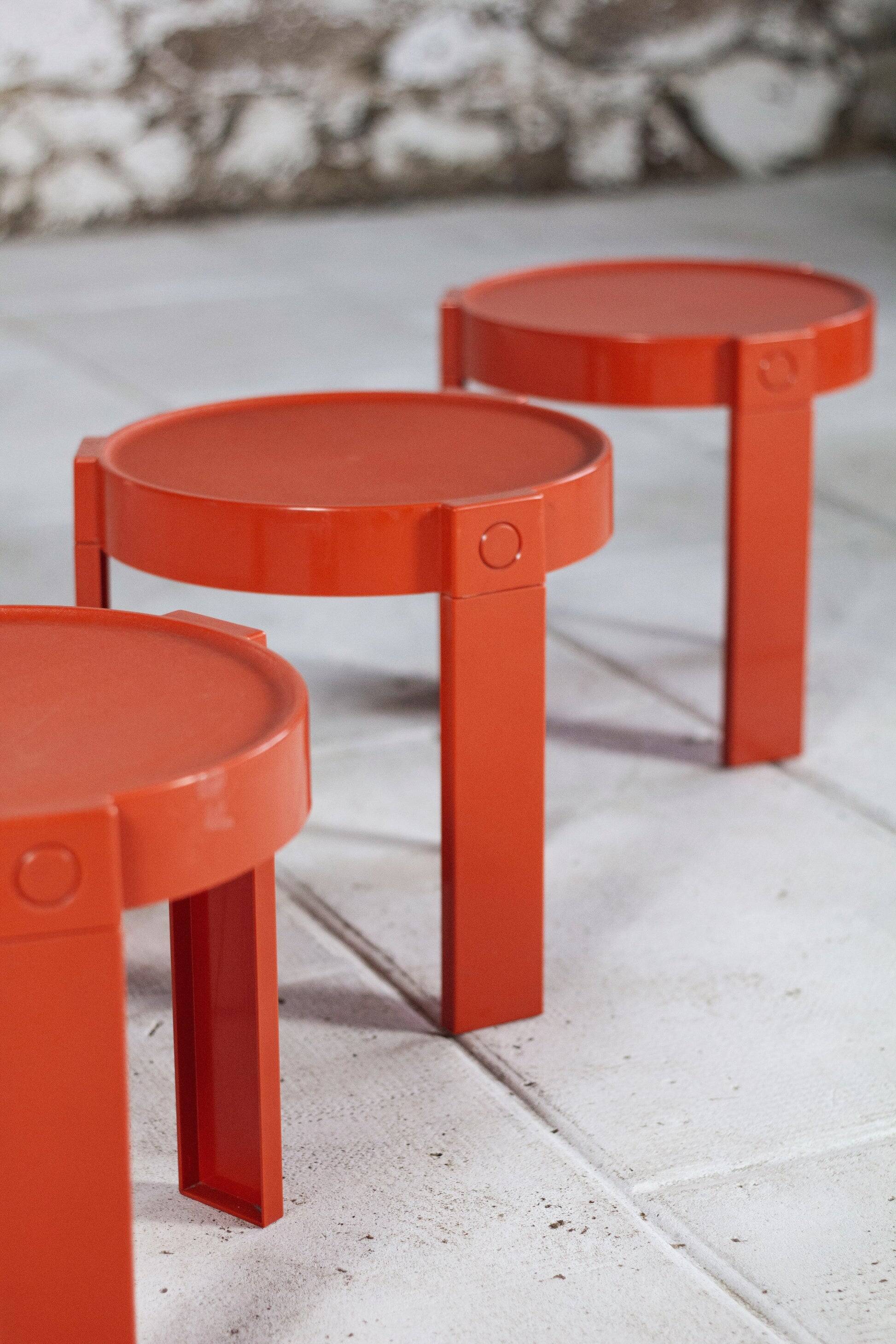 3 nesting tables in orange plastic by Prisunic, 1970.