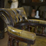 Rotating office chair in mahogany and upholstered leather, from the 1960s