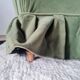 Green velvet armchair