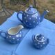 Lavender blue earthenware tea service with white polka dots from Digoin Sarreguemines.