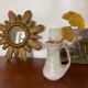 Vintage sun mirror in 60s/70s gold resin