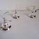 4-light silver metal candle holder