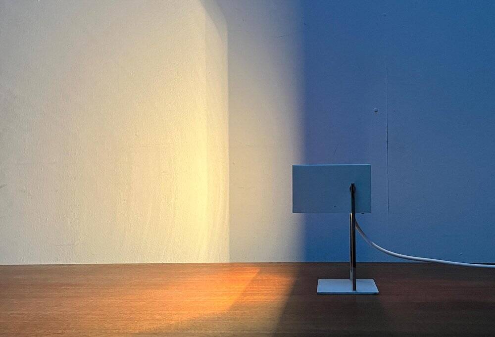Mid-century minimalist German table lamp in cube by Kaiser Idell Leuchten, 1960s.