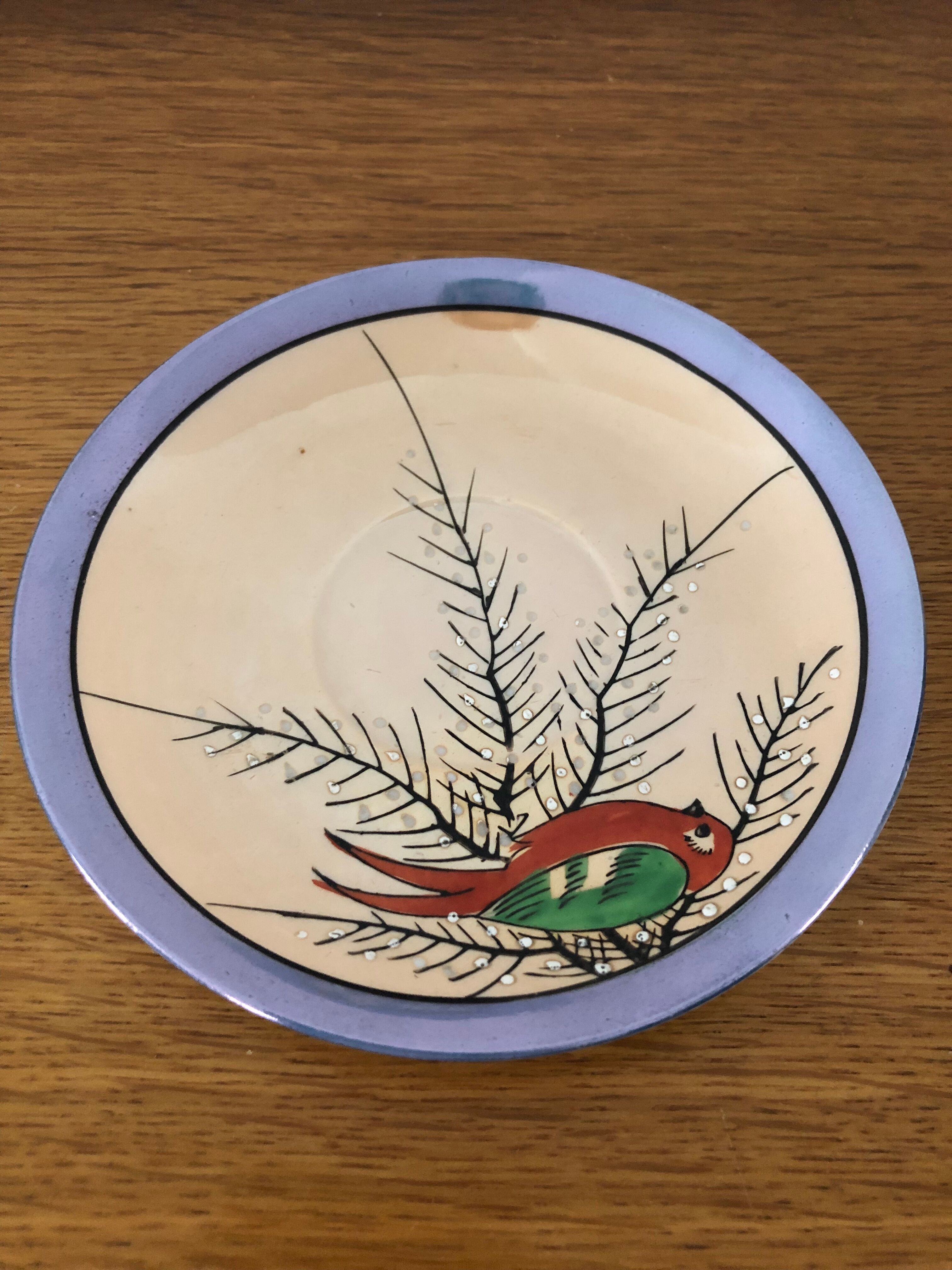 Coffee cup and under cup or tea made of iridescent Japanese porcelain